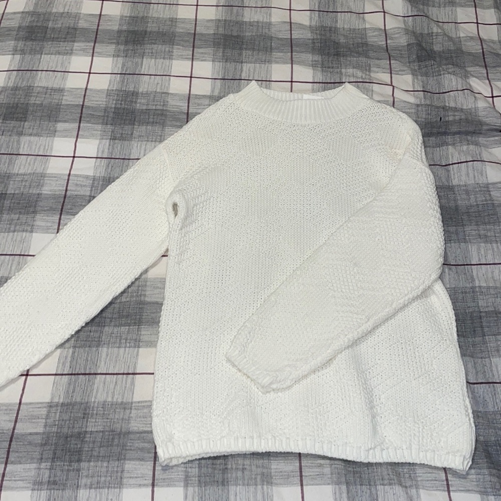 Adorable knit sweater with high neck! Looks a little oversized!